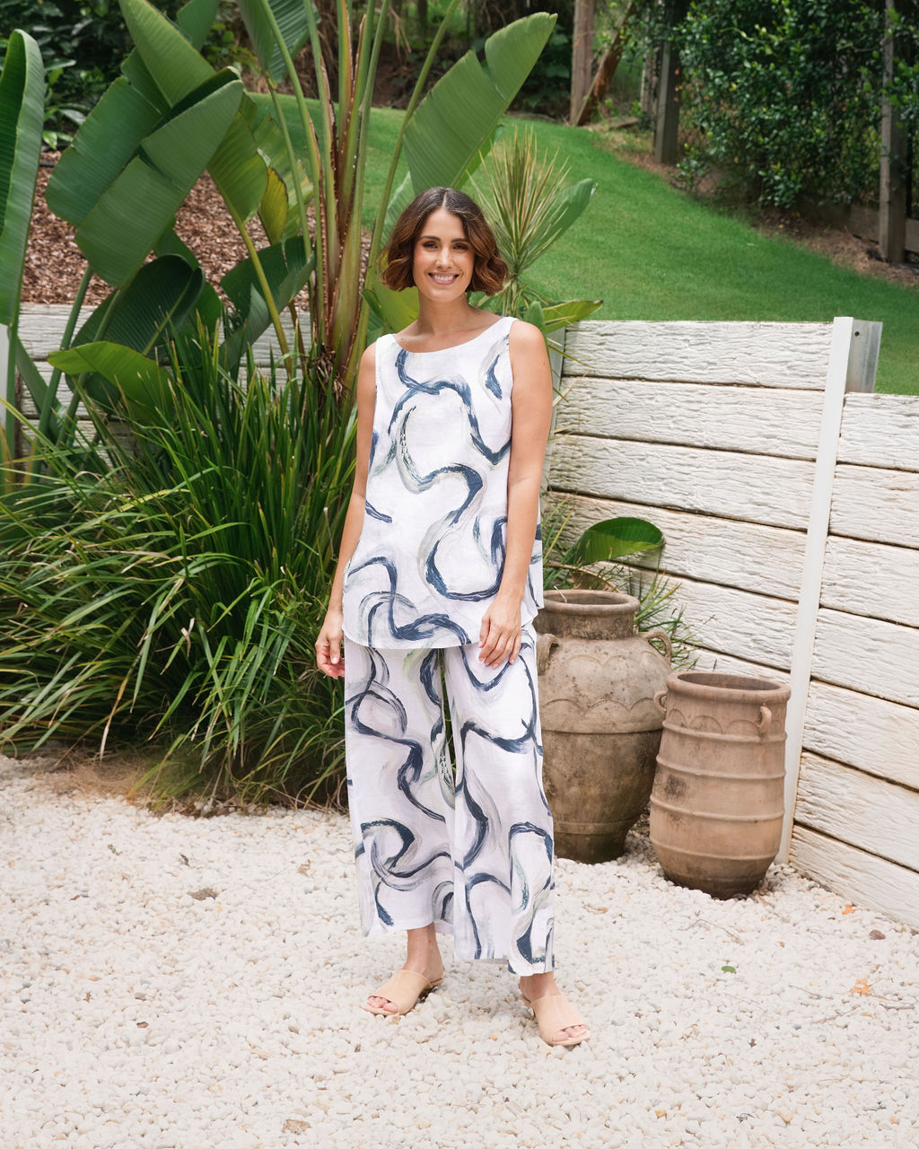 Model wearing See Saw 100% Linen Riverstone set including the Palazzo pant.
