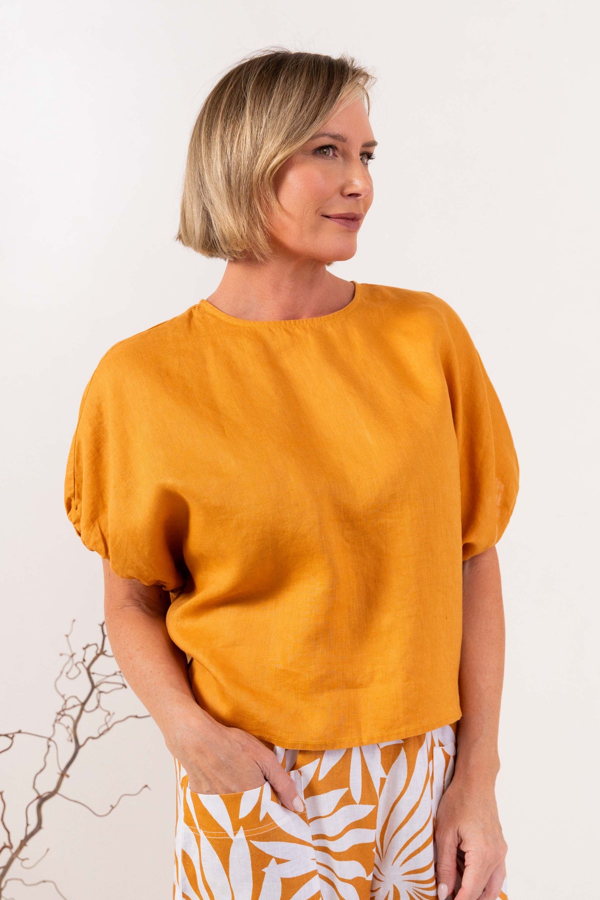 Model wearing marigold 100% linen elastic sleeve top with summer days linen pant by See Saw